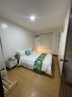 Pet-friendly 1BR Condo Unit in Imus with Wifi Netflix -Min 2 nights